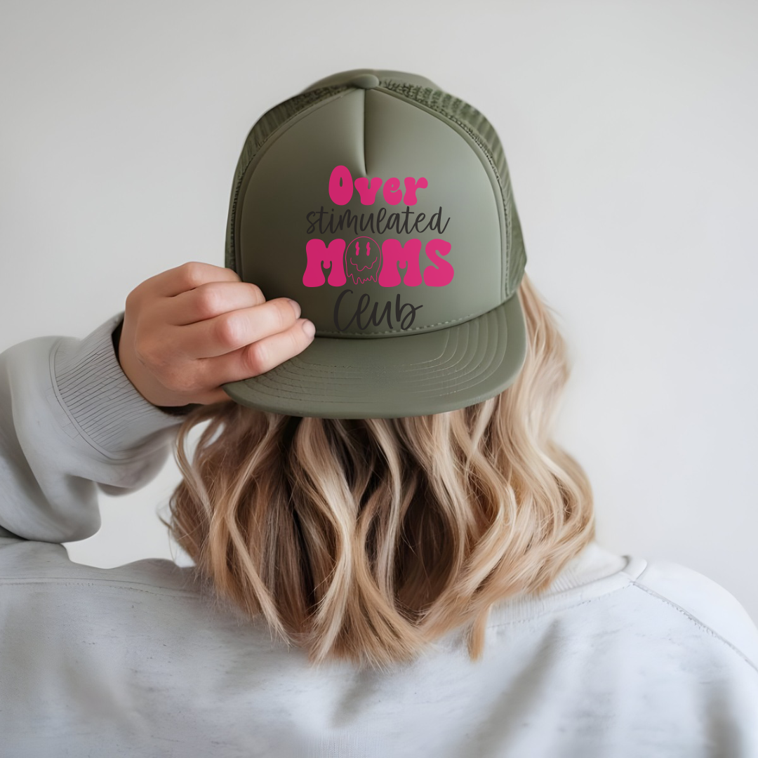 Over stimulated moms club trucker hat